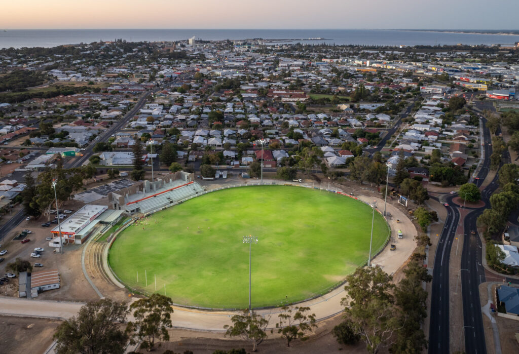 The sun sets over Koombana Bay, as the Hands Oval redevelopment is captured by drone.
